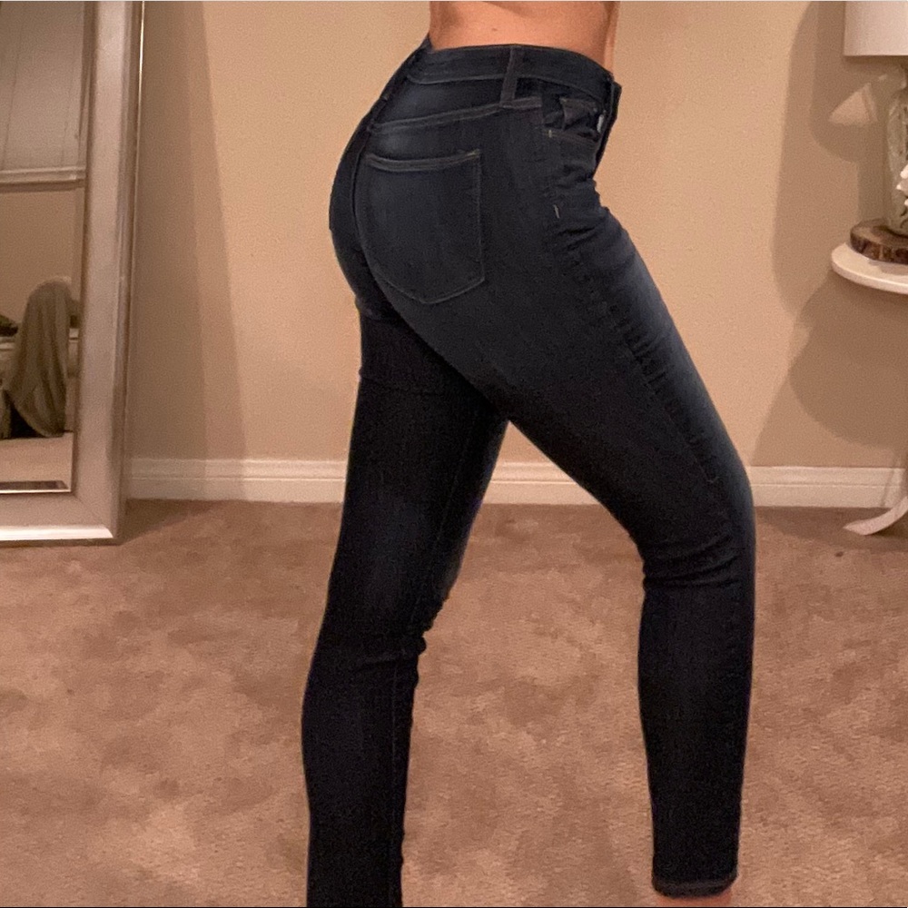 Dark blue wash mid-rise skinny jeans